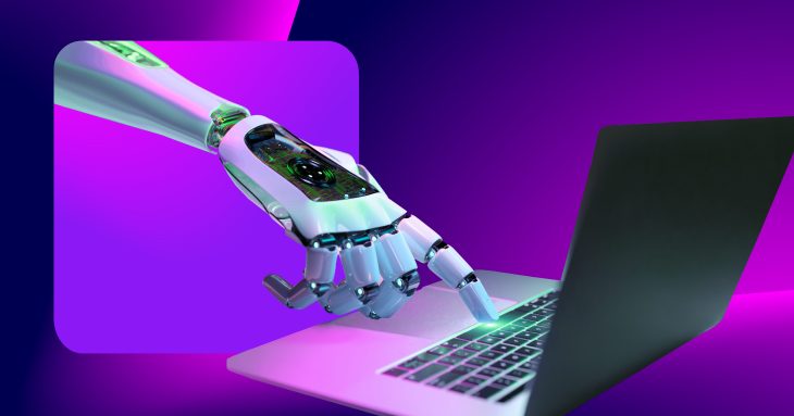 Roboterhand tippt auf einem Laptop: KI als Akteur statt als Werkzeug